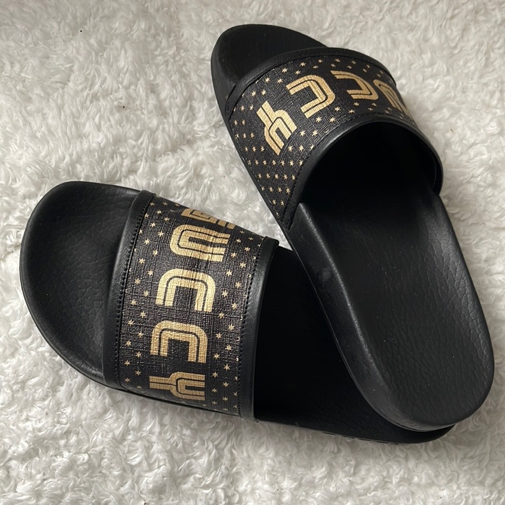 Gucci slippers size 7.5 black and gold